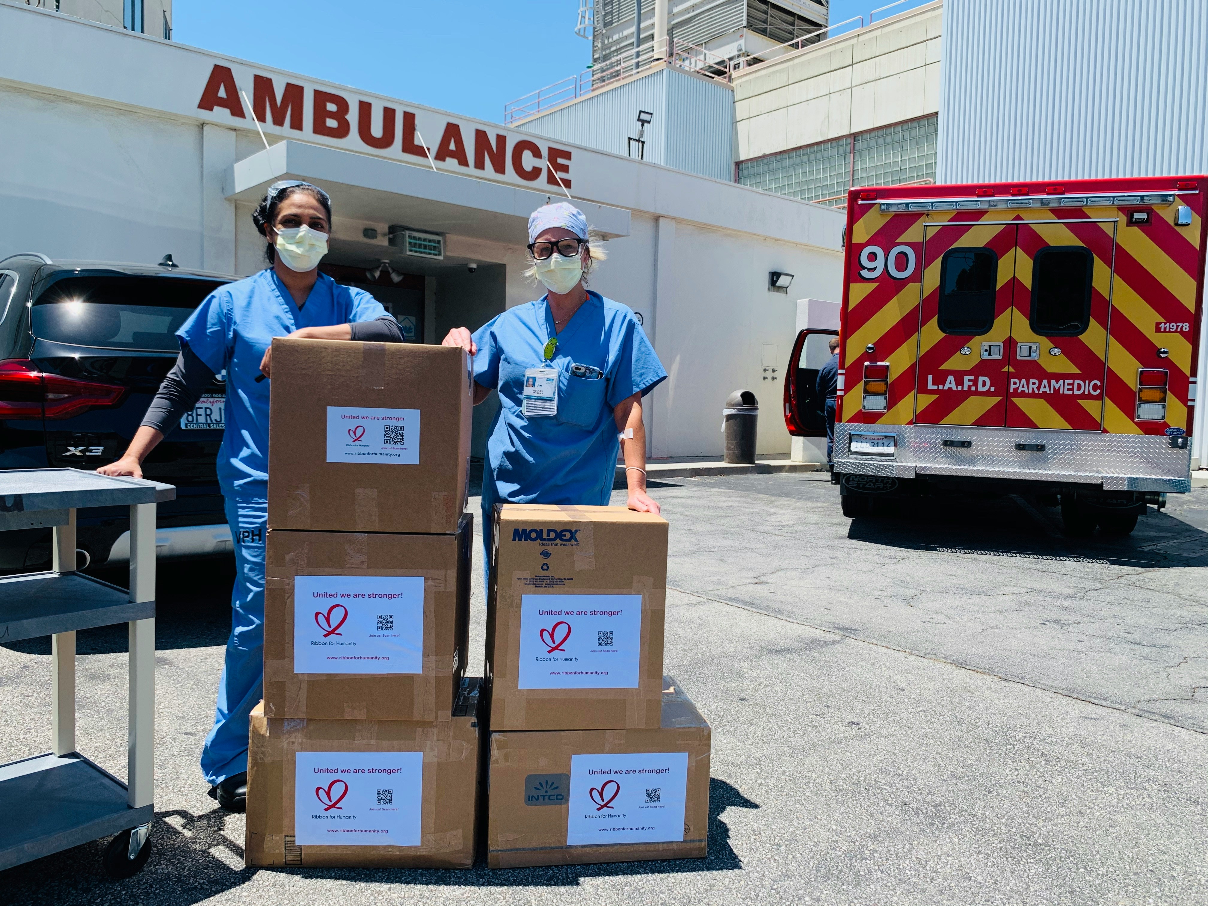 Healthcare professionals with medical supply delivery